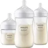 Three Philips Avent baby bottles filled with milk, arranged in a group against a white background. Anteprima dell’immagine prodotto