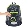 A hand is shown opening the zipper of a child's backpack. Produktbild-Vorschau
