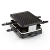A black electric raclette grill with a ribbed top surface and two sliding trays underneath, shown on a white background. Produktbild-Vorschau