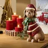 A festive Christmas scene with LED candles and a decorative dog figurine. Produktbild-Vorschau