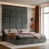 A modern bedroom with a large upholstered headboard, a bed with pillows and a throw blanket, and a window with curtains. Anteprima dell’immagine prodotto