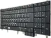 A black keyboard is shown from a diagonal angle against a white background. Produktbild-Vorschau