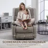 A woman and a child are sitting in a recliner chair, reading a book. The chair is in a living room setting. Anteprima dell’immagine prodotto