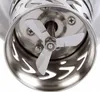 Close-up view of the blades and inner workings of a kitchen appliance. Produktbild-Vorschau