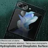 A close-up of a phone screen protector with a floral design, set against a dark, wet background with water droplets. Náhled obrázku produktu
