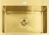 A top-down view of a gold sink with a drain. Podgląd zdjęcia produktu