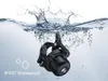 A black bicycle bell submerged in water with a splash. Podgląd zdjęcia produktu