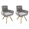 Two gray upholstered chairs with gold legs are shown against a white background. Náhled obrázku produktu