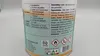 A close-up view of a can with product information and safety symbols. Produktbild-Vorschau