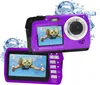 A purple digital camera is shown with water splashes around it. The camera screen displays a photo of a person swimming underwater. Náhled obrázku produktu