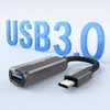 A USB-C to USB-A OTG adapter with charging function is shown in front of large blue 3D letters spelling "USB 3.0". Náhľad obrázku produktu