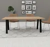 A dining table with chairs in a room. Podgląd zdjęcia produktu