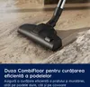 A vacuum cleaner head is shown cleaning a wooden floor with some dirt and debris. Produktbild-Vorschau