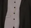 A close-up view of a man's waistcoat and part of a jacket. Produktbild-Vorschau