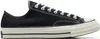 A black Converse Chuck 70 sneaker with white laces and sole, shown from the side. Anteprima dell’immagine prodotto