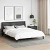 A bedroom scene with a bed, nightstand, and artwork. Produktbild-Vorschau