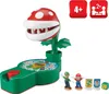 A Super Mario Piranha Plant Escape! board game set with figures and dice. Produktbild-Vorschau