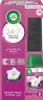 A product shot of an Air Wick automatic spray air freshener starter set, featuring the device and a refill can, with floral imagery and marketing text. Produktbild-Vorschau