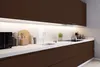 A modern kitchen counter with various appliances and utensils. Produktbild-Vorschau