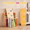 A wooden Pikler triangle climbing toy set is displayed indoors, with text overlays highlighting its features. Voir les images du produit