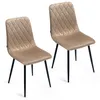 Two beige upholstered dining chairs with black metal legs are shown against a white background. Produktbild-Vorschau
