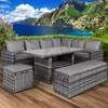 An outdoor seating set with a table and benches is placed on a wooden deck with a scenic coastal mountain backdrop. Produktbild-Vorschau