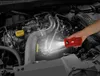 A hand holding a red flashlight illuminates a car engine. Anteprima dell’immagine prodotto