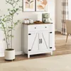 A white sideboard with a wooden top, a green coffee maker, and decorative items on top, placed next to a potted plant. Produktbild-Vorschau