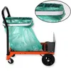 A green trash bag is attached to an orange and black hand truck, with a close-up inset showing how the bag is secured. Produktbild-Vorschau
