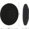 Two views of black foam ear pads, with dimensions indicated. Voir les images du produit