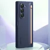 A dark blue Samsung phone case with a rose gold S-Pen holder is displayed on a reflective surface with a blurred, abstract background. Produktbild-Vorschau