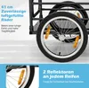 Close-up of a bicycle trailer wheel with text overlays describing its features. Produktbild-Vorschau