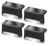 Four black and silver solar-powered LED step lights are arranged in a grid formation against a white background. Produktbild-Vorschau