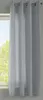 A gray curtain hanging in front of a window with trees visible outside. Produktbild-Vorschau