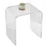 A clear acrylic U-shaped side table with a cup and coaster on top, isolated on a white background. Anteprima dell’immagine prodotto