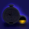 A white alarm clock with a blue background glow. Produktbild-Vorschau