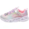 A side view of a single child's sneaker. Produktbild-Vorschau