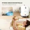 A woman is holding a cat on a couch, with a self-cleaning litter box in the background and a graphic illustrating odor control. Produktbild-Vorschau