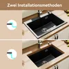 Two installation methods for a black kitchen sink are shown, with diagrams illustrating each method. Produktbild-Vorschau