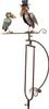 A decorative garden stake featuring two metal birds on a perch. Podgląd zdjęcia produktu