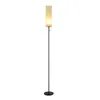 A tall, slender floor lamp with a rectangular beige fabric shade and a black metal base and pole, set against a plain white background. Anteprima dell’immagine prodotto
