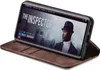 A smartphone in a brown flip case is displayed, showing a movie poster on its screen. Produktbild-Vorschau