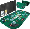 A poker table mat and accessories are laid out on a white background, with a carrying case to the left and a folded accessory to the top right. Produktbild-Vorschau