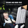 A baby sits in a car seat next to a piece of soundproofing material, with leaves floating around. Produktbild-Vorschau