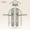 A promotional image showcasing a pair of door handles against a decorative background. Produktbild-Vorschau