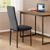 A dark gray chair is placed next to a wooden desk with a laptop and books. Anteprima dell’immagine prodotto