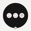 A dark circular background with three icons and a logo at the bottom. Náhled obrázku produktu