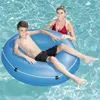A woman and a boy are in a swimming pool on a blue inflatable ring. Náhľad obrázku produktu