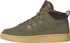A side view of a green Adidas mid-top sneaker with a brown sole and brown lining. Voir les images du produit