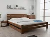 A wooden bed frame with white bedding in a bedroom setting. Náhled obrázku produktu